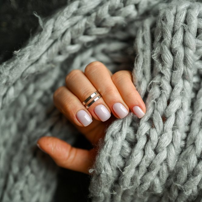 Women's,Hands,With,The,Colorful,Pattern,On,The,Nails.
