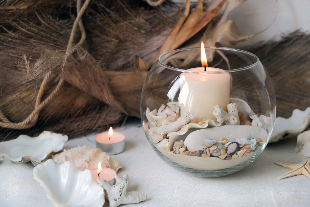 Burning,Candles,In,Candlesticks,Decorated,In,A,Nautical,Style,With