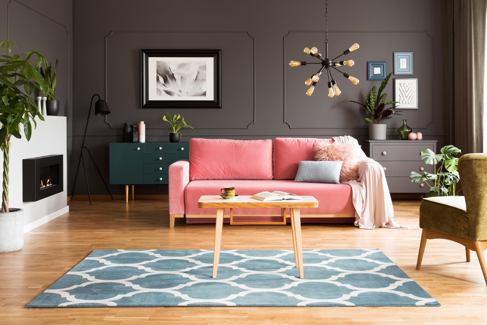 Wooden,Table,On,Blue,Carpet,In,Grey,Living,Room,Interior