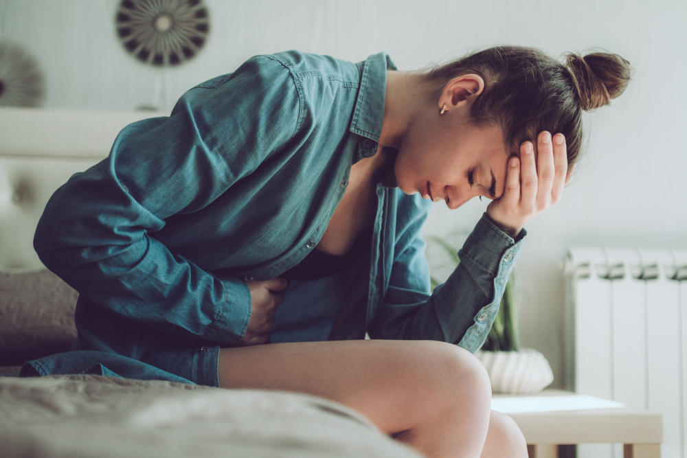 Sad,,Unhappy,Woman,Suffering,From,Pms,And,Menstruation,Pain.,Having