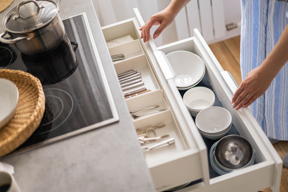 Top,View,Modern,Housewife,Tidying,Up,Kitchen,Cupboard,During,General