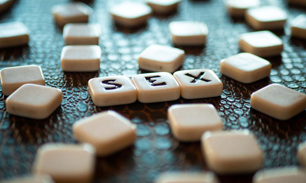 Square,Pieces,With,Letters,From,A,Board,Game,Forming,The
