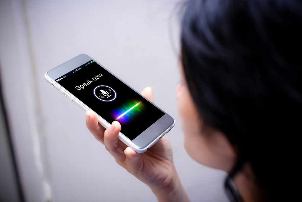 Voice,Recognition,search,Technology,Concept.close-up,Of,Woman,Talking,On,Her,Mobile
