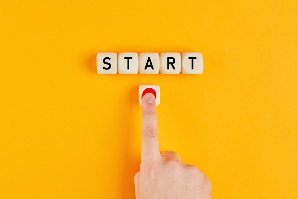 The,Word,Start,On,Wooden,Cubes,With,A,Male,Hand