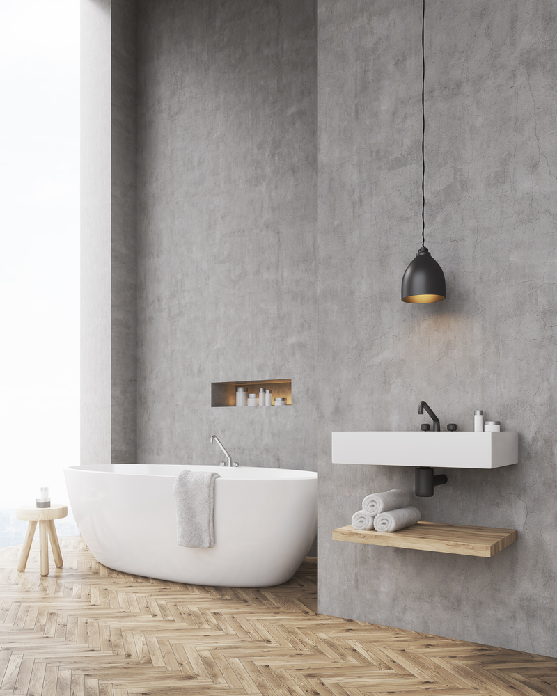 Side,View,Of,Bathroom,With,Concrete,Walls,,A,Chair,And