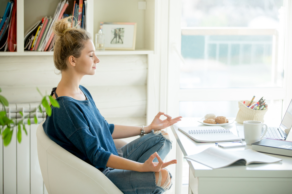 Portrait,Of,An,Attractive,Woman,In,A,Chair,At,The