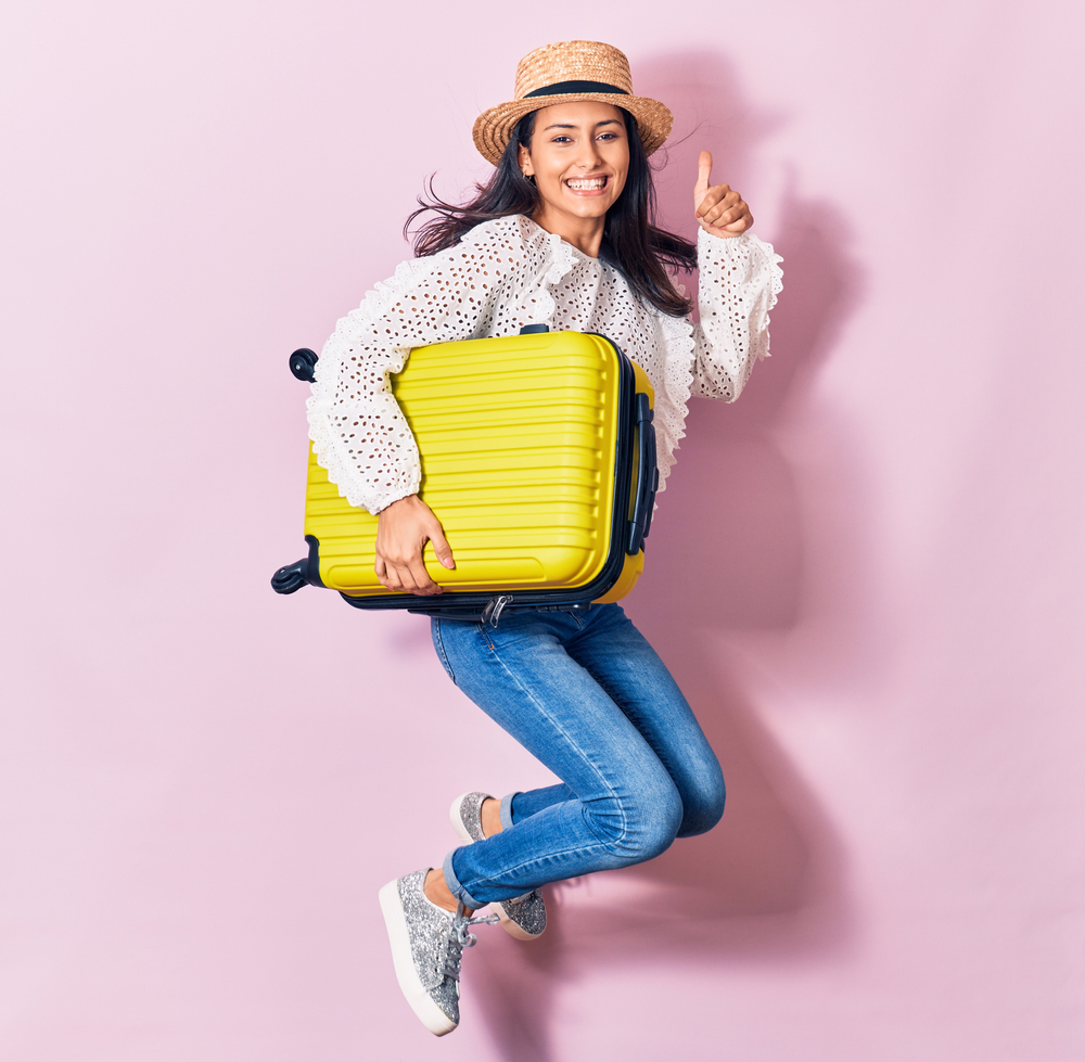 Young,Beautiful,Woman,On,Vacation,Wearing,Summer,Clothes,And,Hat