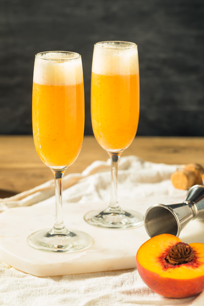 Refreshing,Boozy,Peach,Bellini,Cocktail,With,Prosecco