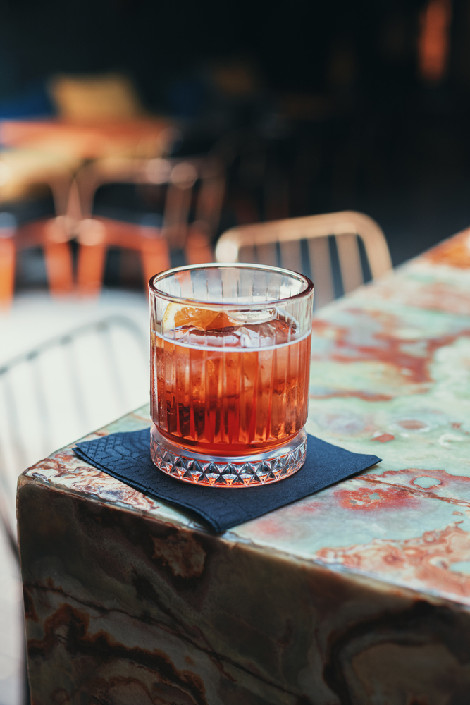 Negroni,Sbagliato,On,Stone,Texture,Side,View