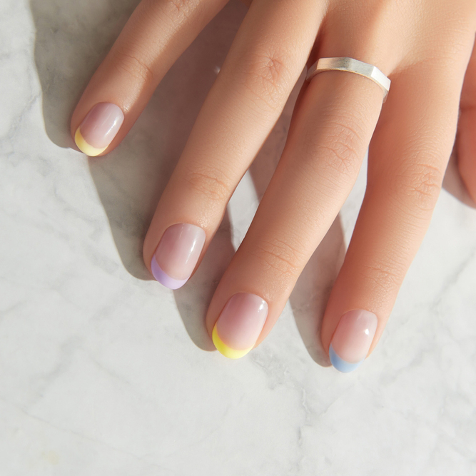 Beautiful,Womans,Hand,With,Spring,Summer,Nail,Design,On,Marble