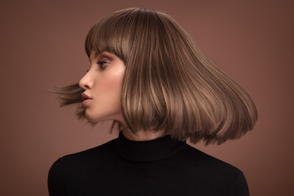 Portrait,Of,A,Beautiful,Brown-haired,Woman,With,A,Short,Haircut