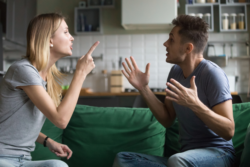 Angry,Millennial,Couple,Arguing,Shouting,Blaming,Each,Other,Of,Problem,
