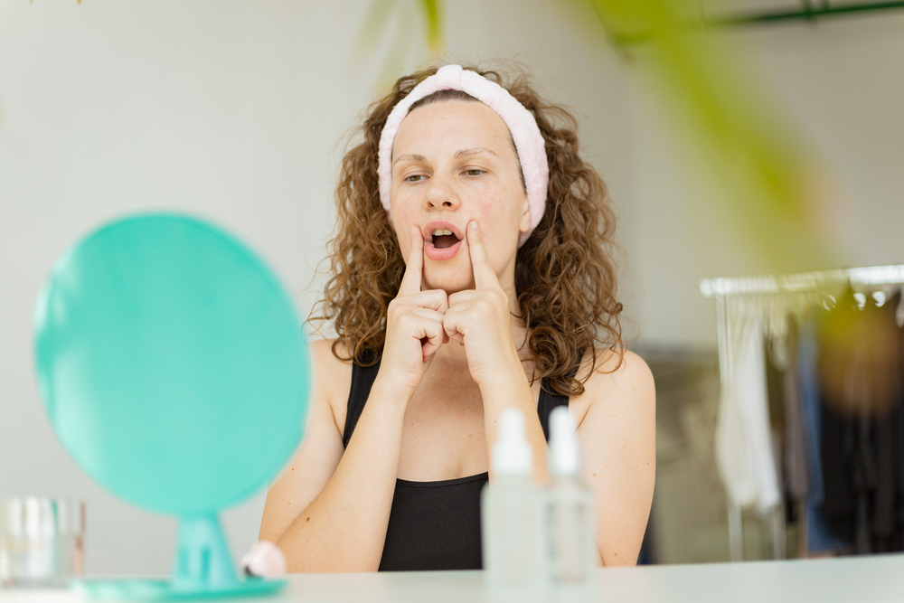 The,Girl,Performs,Facial,Yoga-doing,Exercises,To,Smooth,Out,The
