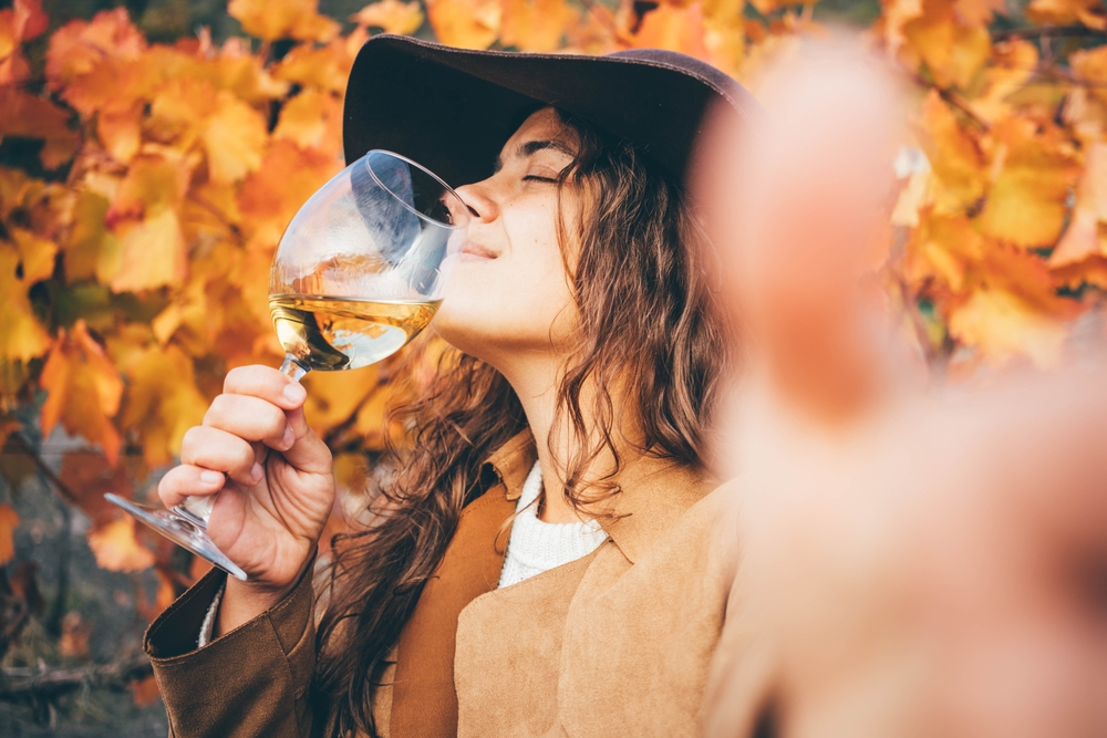 Smiling,Young,Woman,In,Stylish,Hat,And,Coat,Drinks,Delicious