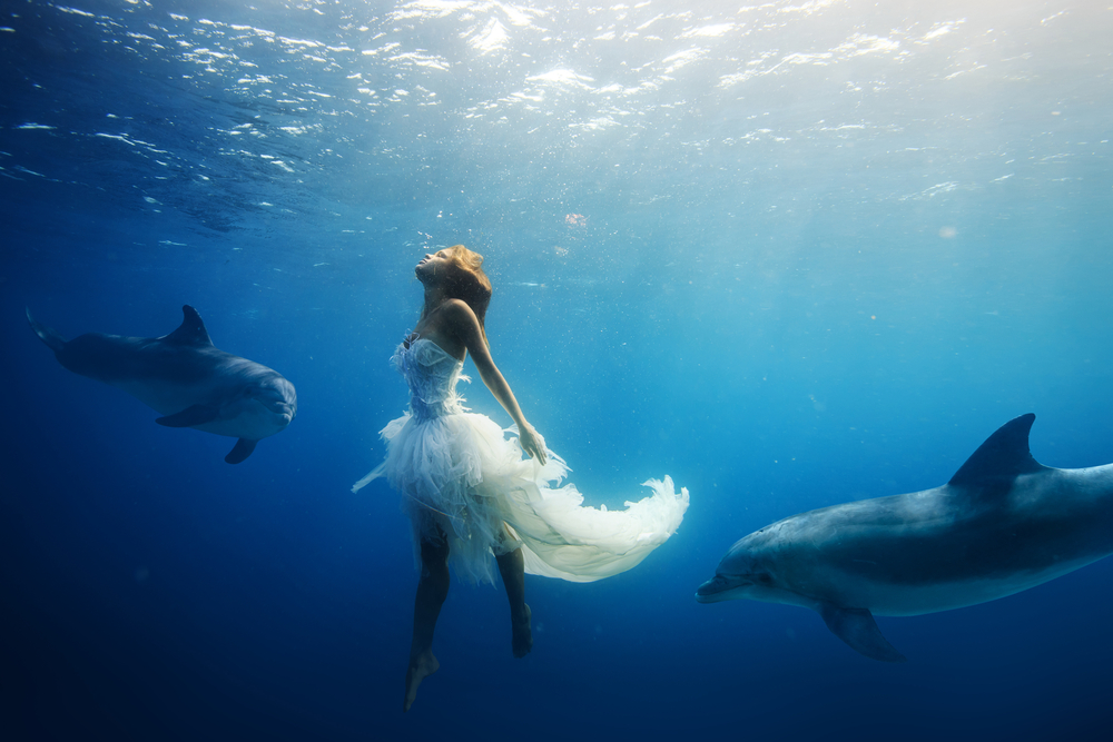 Beautiful,Model,In,White,Dress,Underwater.,A,Girl,Diving,With