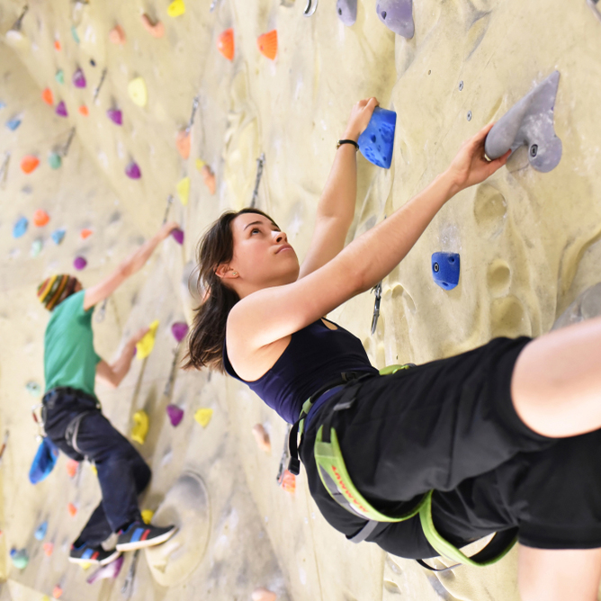People,Bouldering,In,A,Climbing,Hall,-,Indoor,Sports
