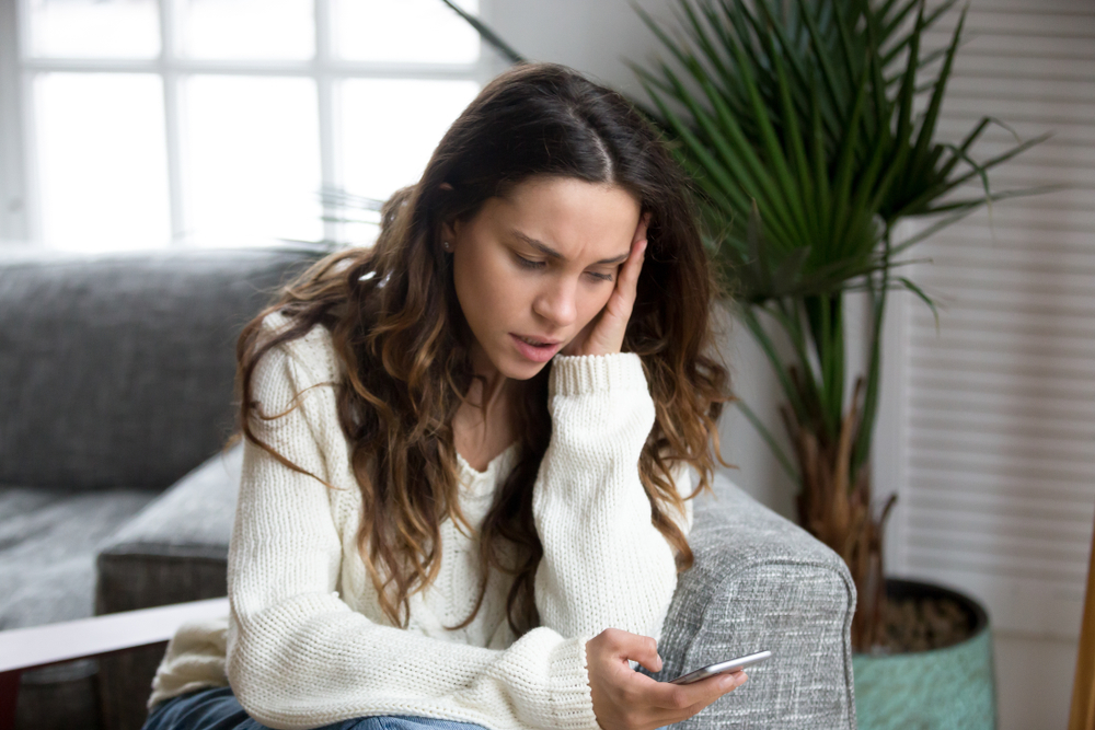 Sad,Girl,Feeling,Upset,Reading,Bad,News,In,Mobile,Message