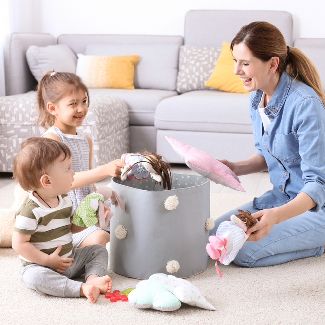 Housewife,And,Children,Picking,Up,Toys,After,Playing,At,Home