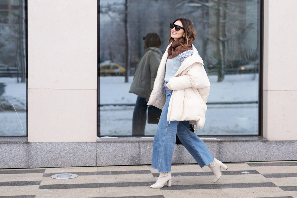 European,Model,Girl,In,A,Beige,Oversized,Down,Jacket,,Knitted