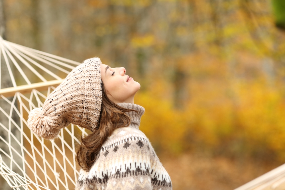 Profile,Of,A,Relaxed,Woman,Breathing,Fresh,Air,Sitting,On