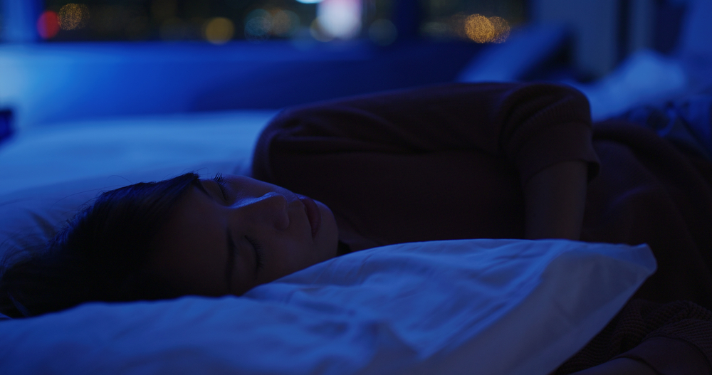 Woman,Sleep,On,Bed,At,Night