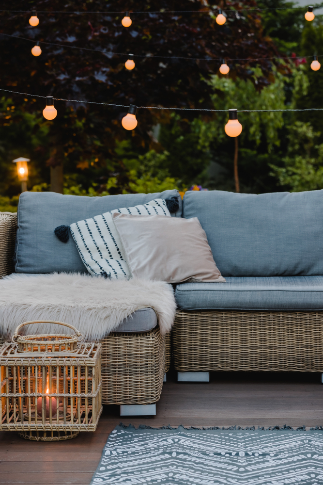 Beautiful,Green,Garden,With,Wicker,Terrace,Furniture,And,Trees
