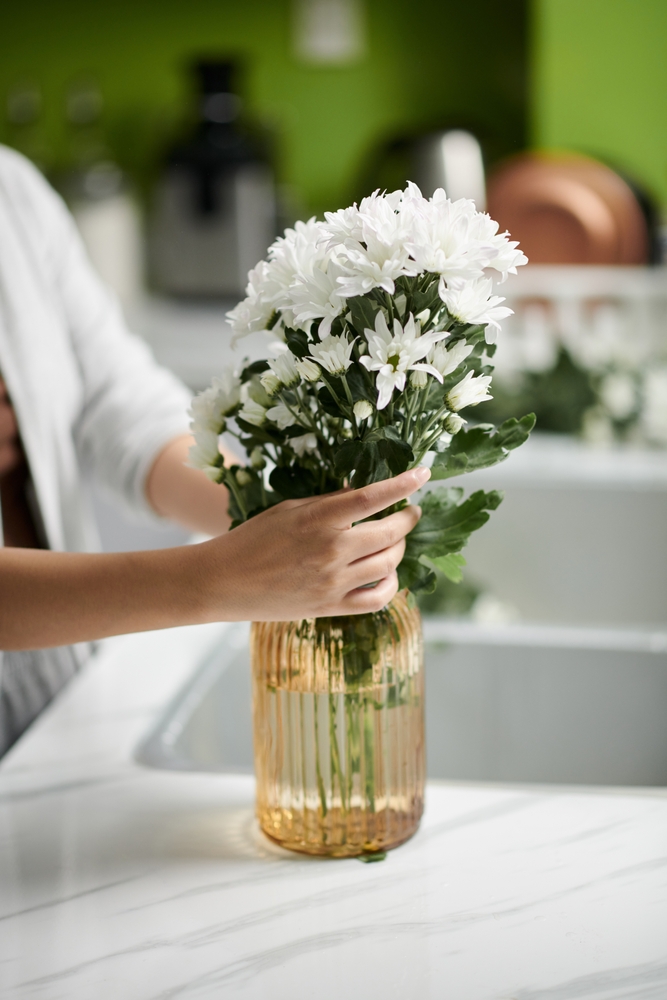 Closeup,Image,Of,Woman,Putting,Blooming,Flowers,In,Vase,On