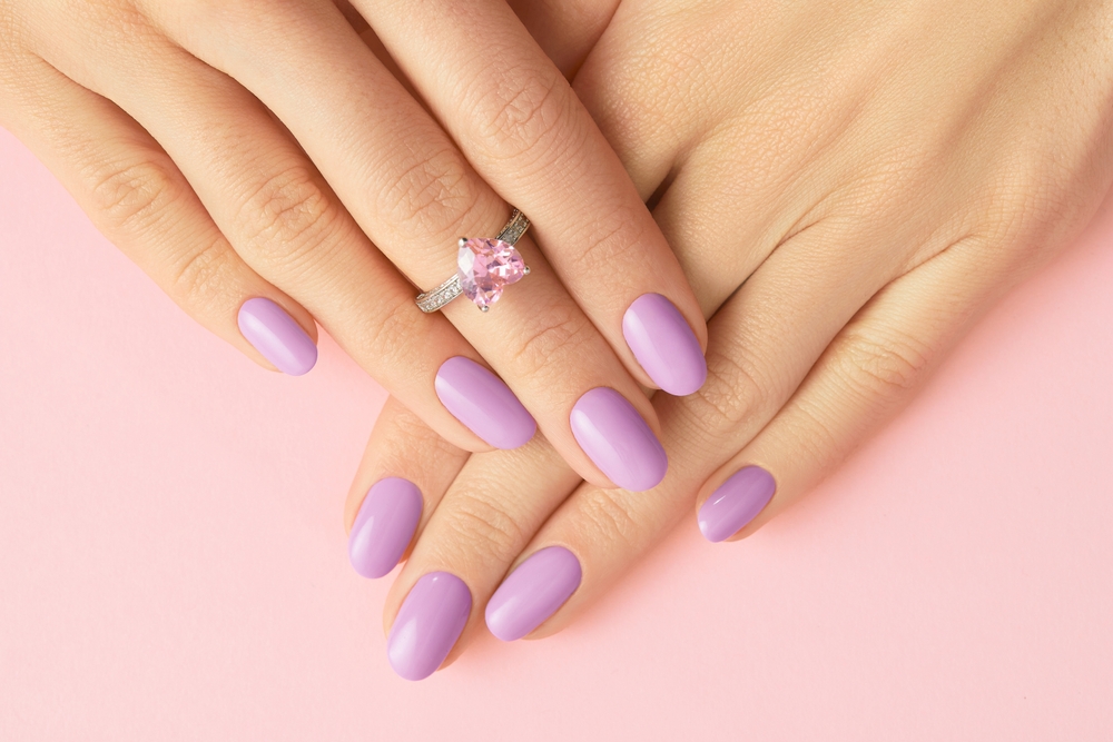 Womans,Hands,With,Fashionable,Lavender,Manicure.,Spring,Summer,Nail,Design