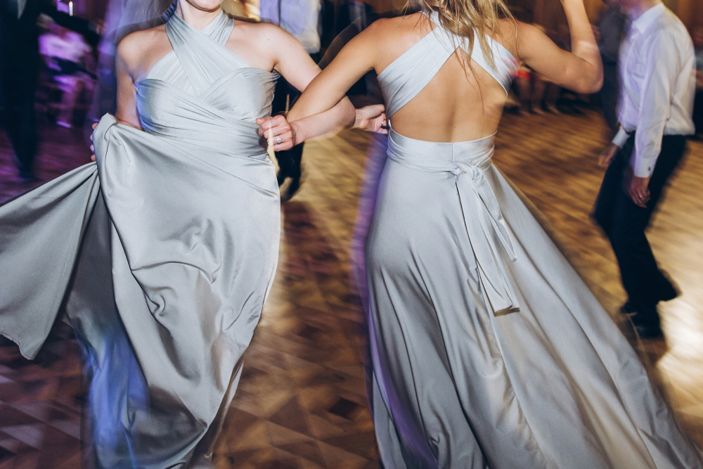 Happy,Stylish,Bride,And,Bridesmaids,Dancing,And,Having,Fun,At