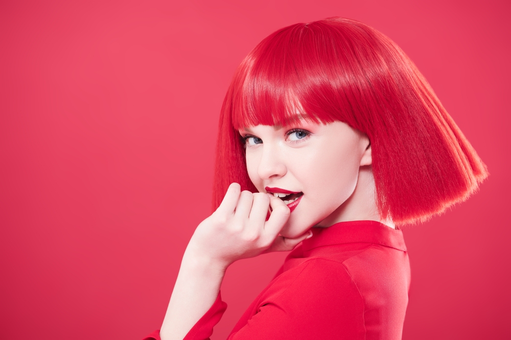 A,Pretty,Girl,With,Bright,Red,Hair,And,Red,Lipstick