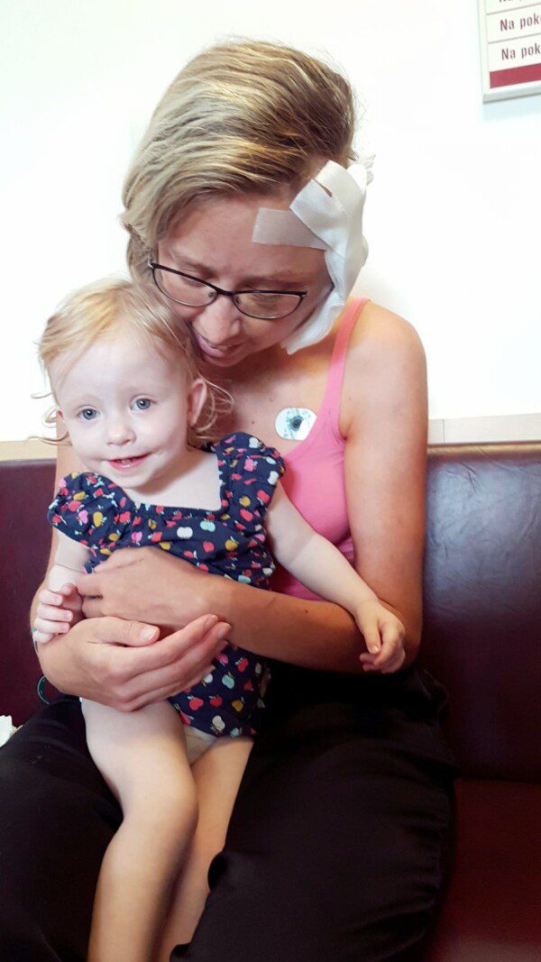 with my daughter after surgery in the hospital