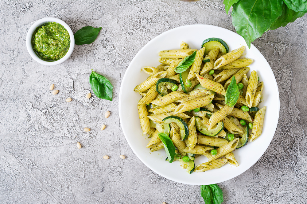 Penne,Pasta,With,Pesto,Sauce,,Zucchini,,Green,Peas,And,Basil.