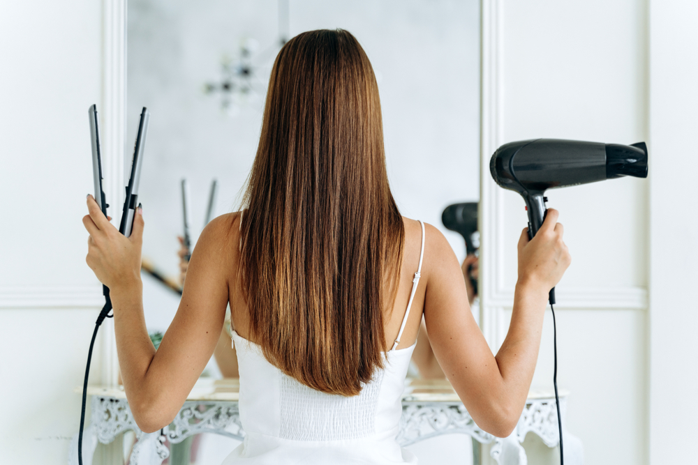Back,View,Of,The,Pretty,Young,Woman,Posing,For,The