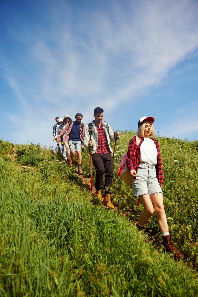 Group,Of,Friends,,Young,People,Walking,Down,The,Hill,Path,
