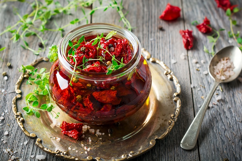 Sun,Dried,Tomatoes,With,Thyme,And,Sea,Salt,In,An
