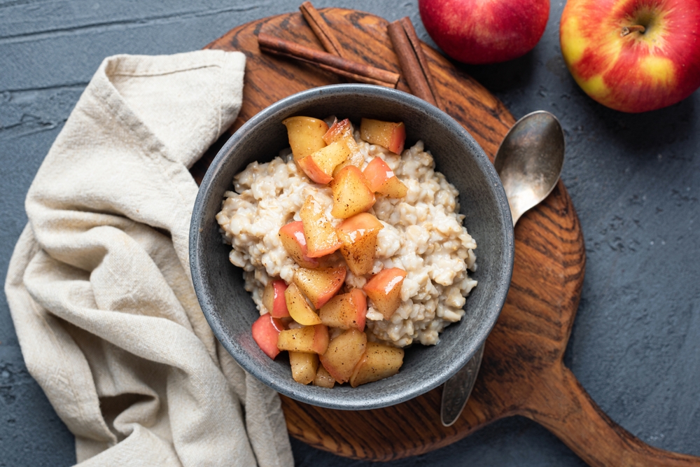 Breakfast,Oatmeal,Porridge,Bowl,With,Apple,And,Cinnamon,,Table,Top