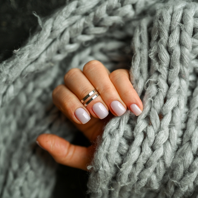 Women's,Hands,With,The,Colorful,Pattern,On,The,Nails.