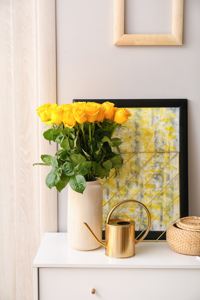 Vase,With,Beautiful,Yellow,Roses,On,Chest,Of,Drawers,In