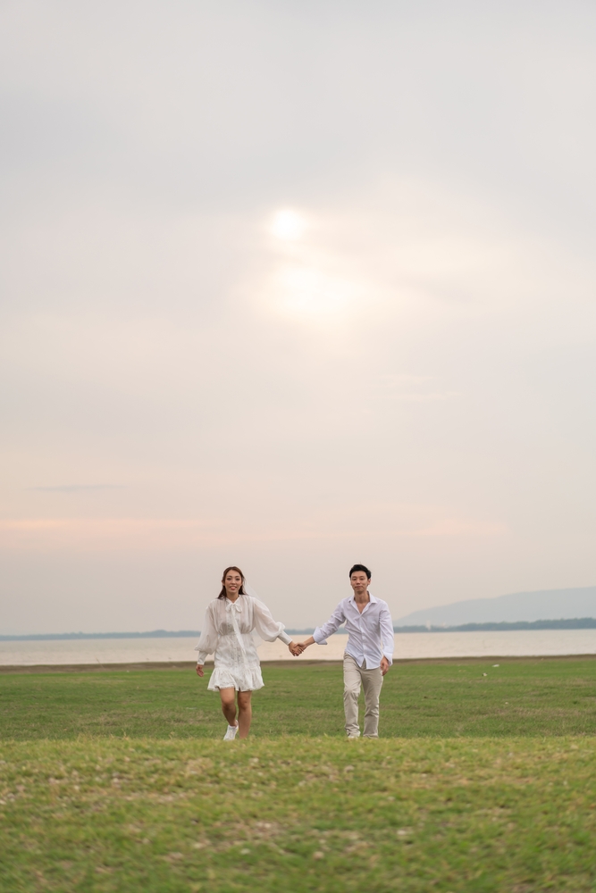 Happy,Young,Asian,Couple,In,Bride,And,Groom,Clothing,Ready