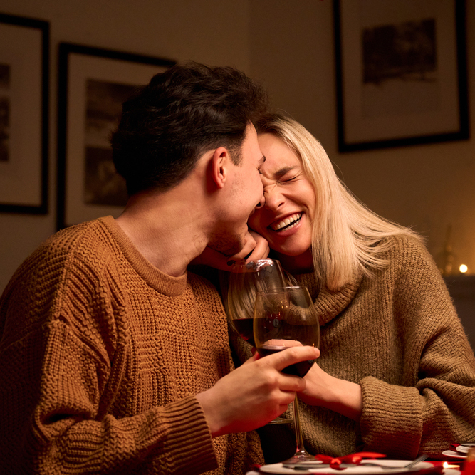 Happy,Young,Couple,In,Love,Hugging,,Laughing,,Drinking,Wine,,Enjoying