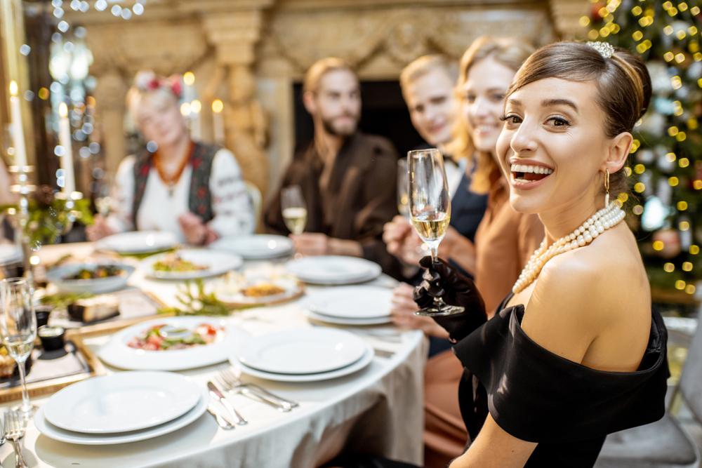 Portrait,Of,A,Well-dressed,Woman,Sitting,During,A,Festive,Dinner
