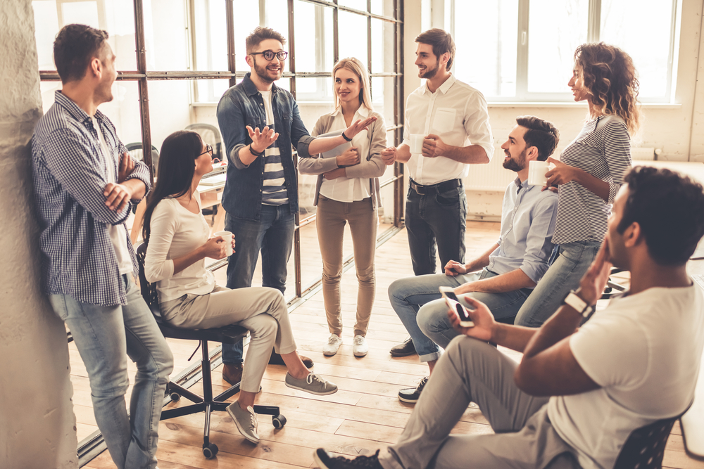 Successful,Young,Business,People,Are,Talking,And,Smiling,During,The