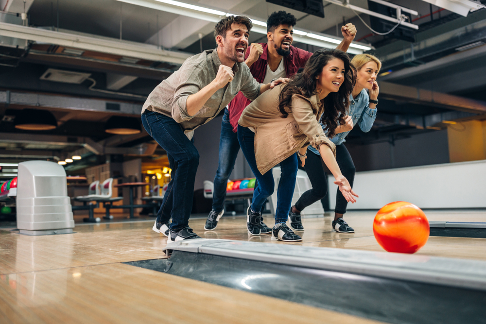 Shot,Of,An,Attractive,Brunette,Throwing,The,Bowling,Ball,While