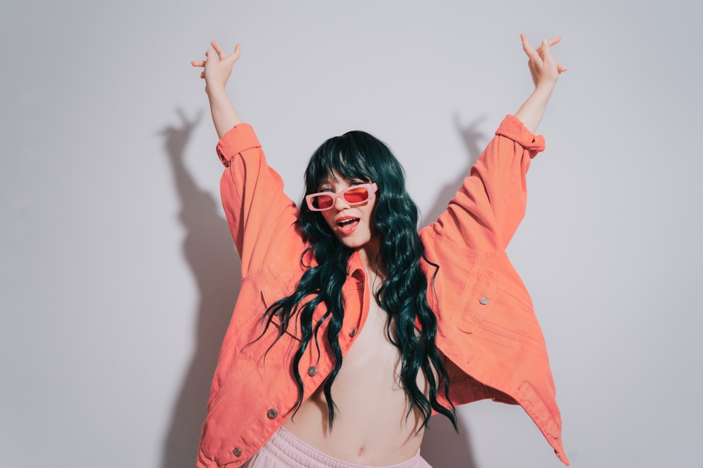 Cheeky,Emotional,Fashion,Young,Woman,With,Long,Green,Color,Hair