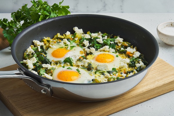 Vegetarian,Delicious,Green,Shakshouka.,Mediterranean,Food,Fried,In,Pan.,Eggs,