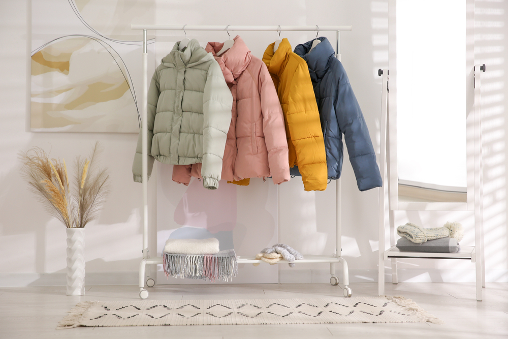 Different,Warm,Jackets,On,Rack,In,Stylish,Room,Interior