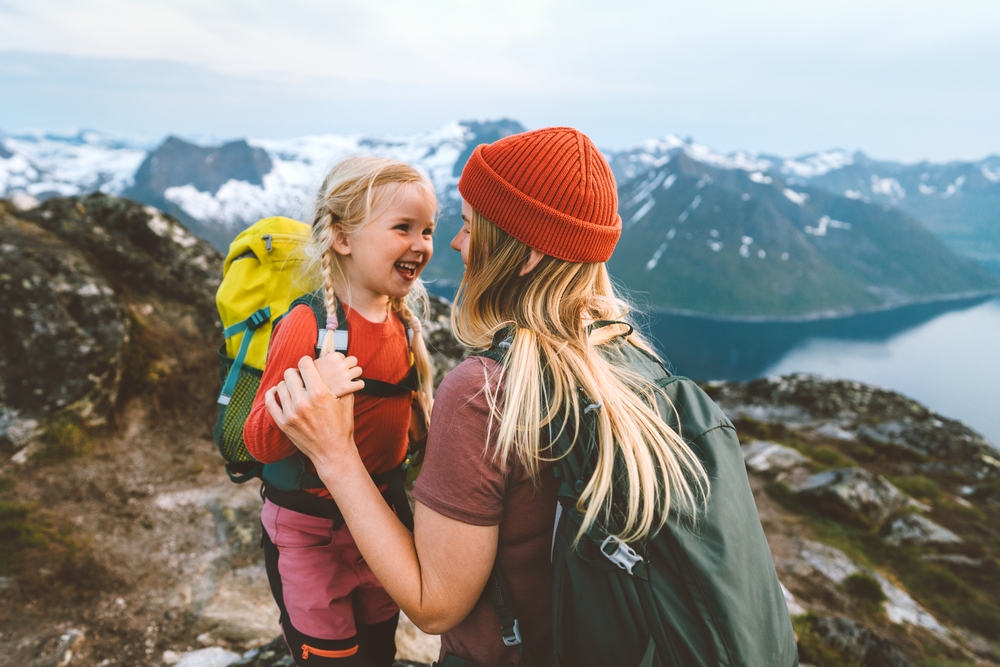 Mother,Hiking,With,Daughter,In,Norway,Mountains,Travel,Together,Family