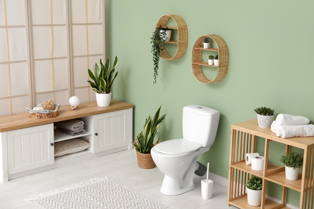 Interior,Of,Stylish,Bathroom,With,Houseplants,And,Ceramic,Toilet,Bowl