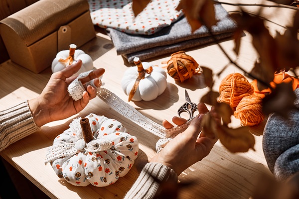 Cozy,Pumpkins.,Woman,Making,Colorful,Fabric,Pumpkins.,Autumn,Decoration,With