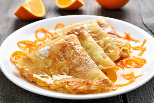Delicious,Crepes,Suzette,With,Orange,Syrup,On,Plate.